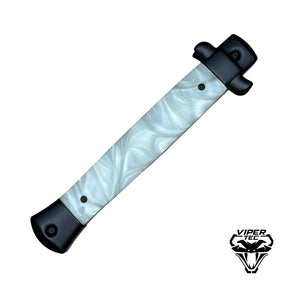 11 inch Italian stiletto OTF knife closed with white pearlex scales and thumb slide