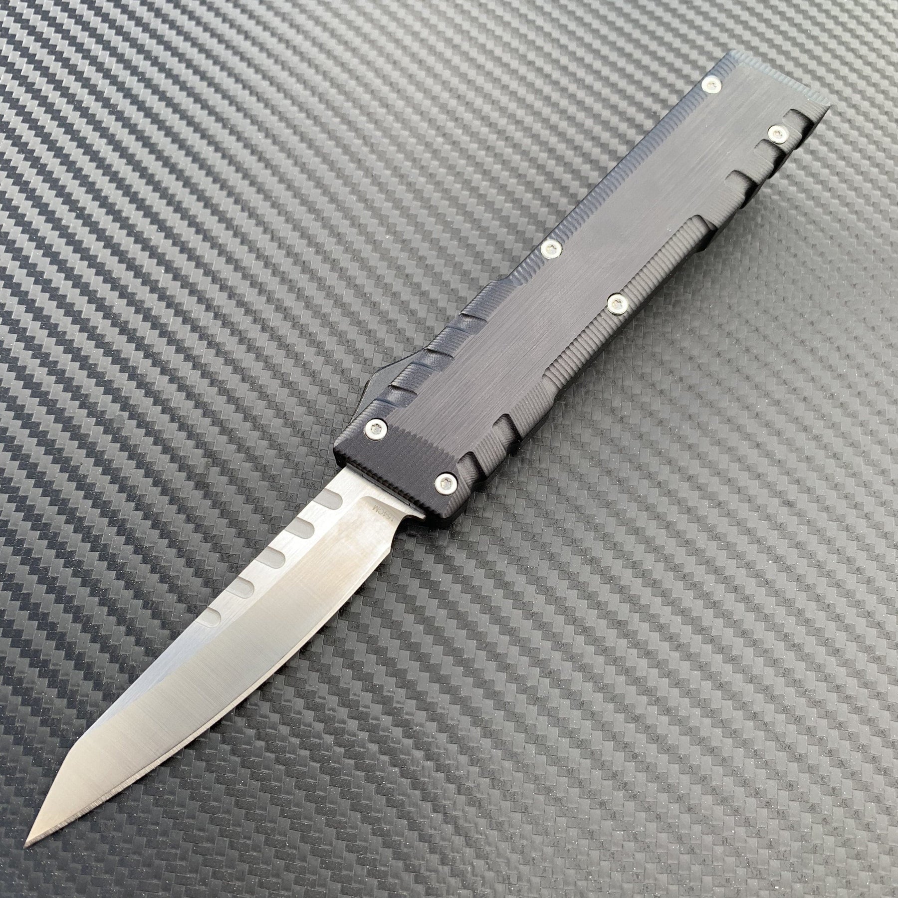 otf knife with premium steel blade